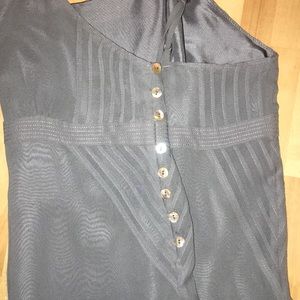 Silk top, stunning opalescent button closure